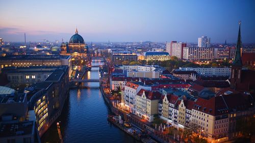 High angle view of illuminated buildings in city