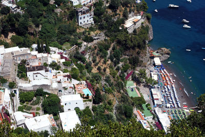 High angle view of town by sea