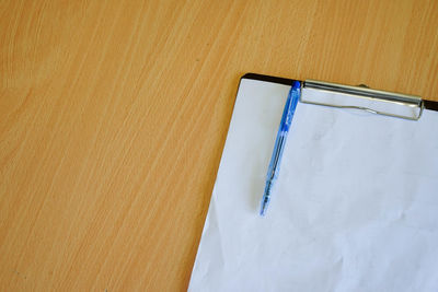 High angle view of mobile phone on table