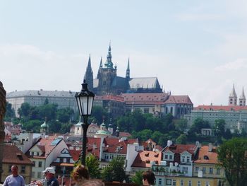 View of buildings in town against sky