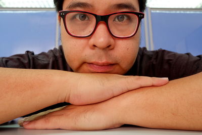 Portrait of young man wearing eyeglasses