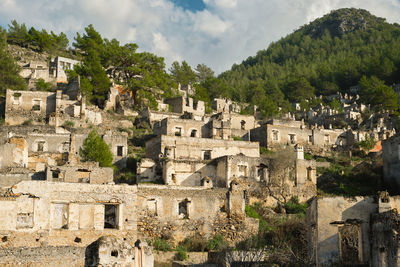 Kayakoy village, abandoned ghost town near fethiye - turkey, ruins of stone houses. 