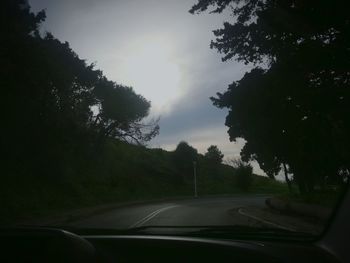 Road seen through car windshield