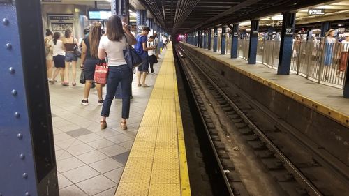 People at railroad station