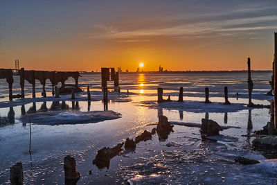 Scenic view of sea against sky during sunset