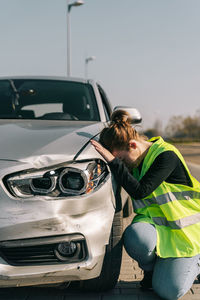 High angle view of woman wearing car