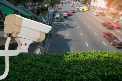 High angle view of security camera in city