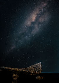 Rock against sky at night