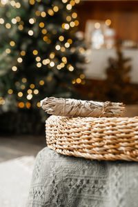 Close-up of illuminated wicker basket