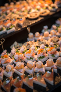 Close-up of fruits in market at night