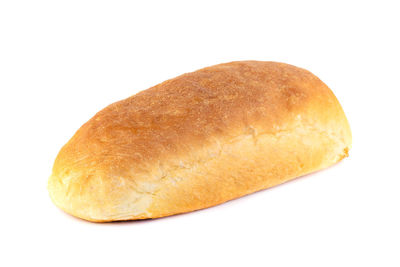 Close-up of bread against white background