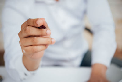 Close-up of hands working