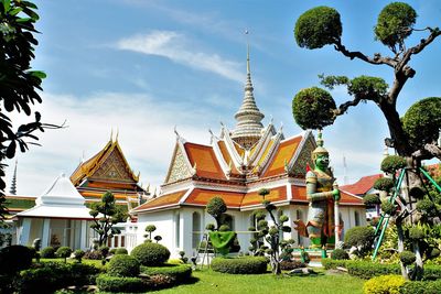 Temple outside building against sky
