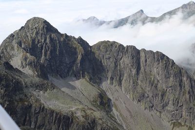 Panoramic view of mountain range against sky