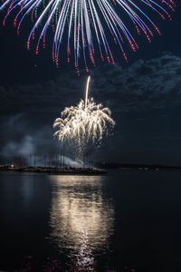 Firework display at night