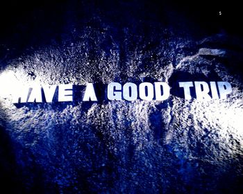 Close-up of text on wall