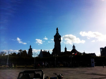 View of buildings against blue sky