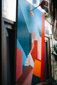 Close-up of multi colored glass on wall