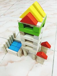 High angle view of multi colored stack on wood