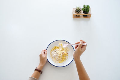 Midsection of woman holding food