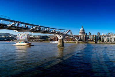 London uk river thames south bank showing viking long boat model with multicoloured peace sail