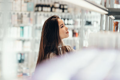 Portrait of woman looking away