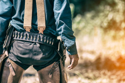 Rear view of man with bullets