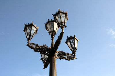 Low angle view of street light against sky