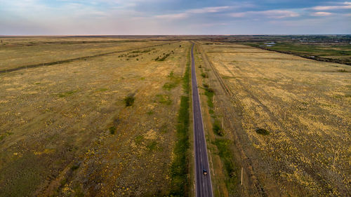 Panoramic shot of land road against sky