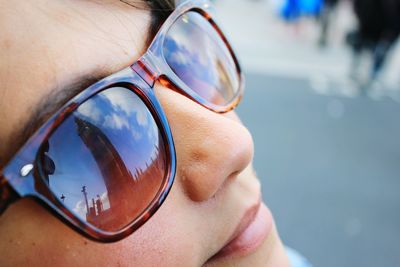 Reflection of big ben tower in sunglasses