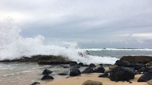 Waves breaking on shore