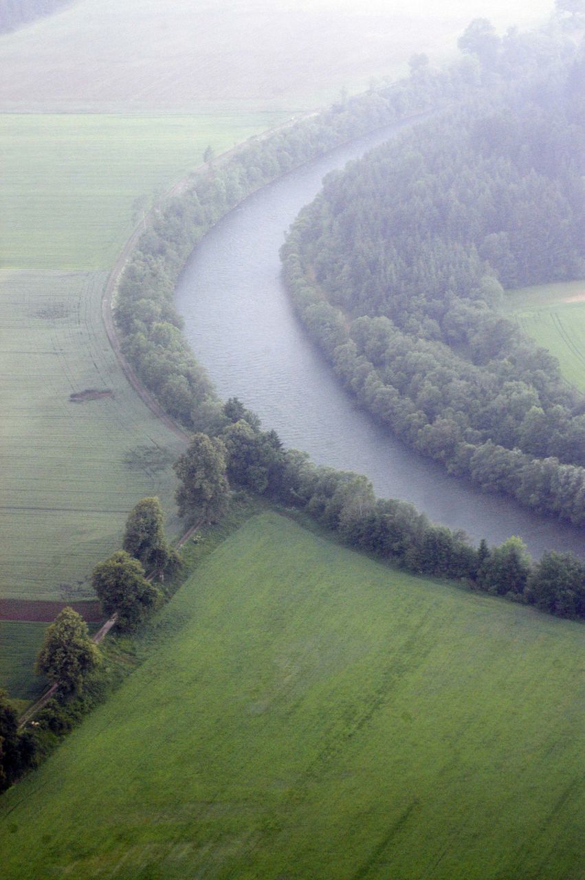 HIGH ANGLE VIEW OF AGRICULTURAL LANDSCAPE