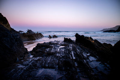 Scenic view of sea against sky during sunset