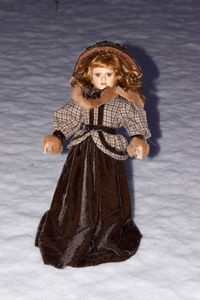 Portrait of a young woman in snow