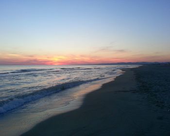 Scenic view of beach during sunset