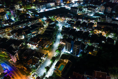 Aerial night illuminated city view patong thailand. clip. bright lights of the night city. 