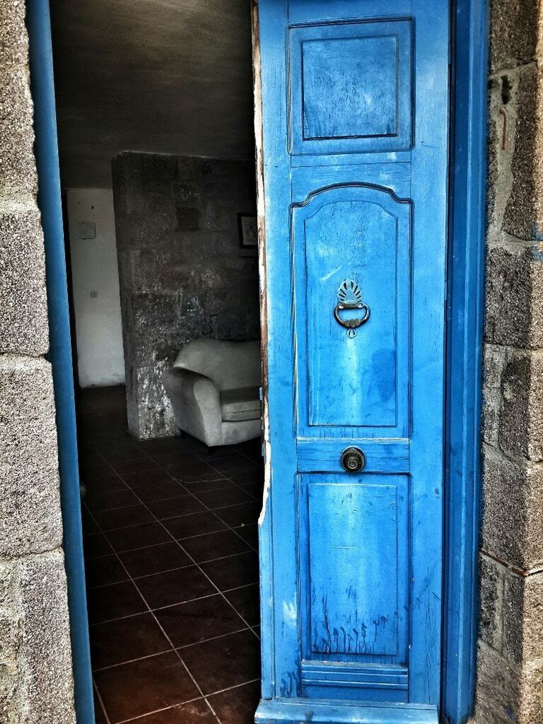 door, closed, safety, protection, security, metal, built structure, building exterior, architecture, entrance, old, blue, wood - material, close-up, closed door, day, weathered, outdoors, no people, wall - building feature