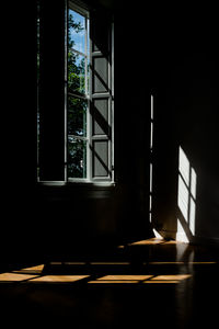 Sunlight streaming through window of house