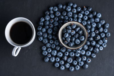 High angle view of black coffee on table