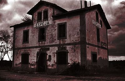 Low angle view of building against cloudy sky