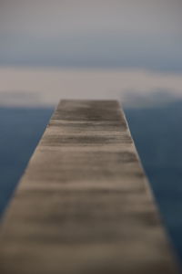 Pier over sea against sky