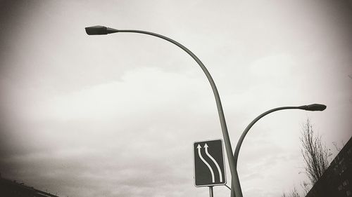 Low angle view of street light against sky