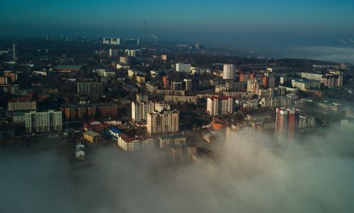 High angle view of buildings against sky in city