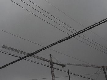 Low angle view of electricity pylon