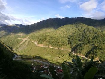 Scenic view of tree mountains against sky