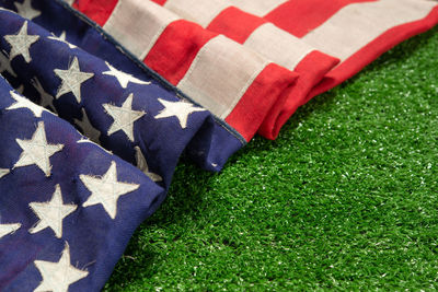 Close-up of flag on grass