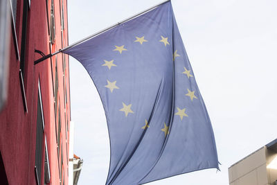 European union flag, blue flag with yellow stars representing the eu