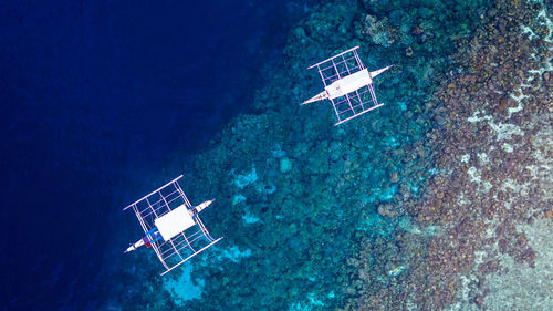 High angle view of information sign in sea