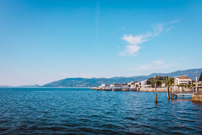 Scenic view of sea against blue sky