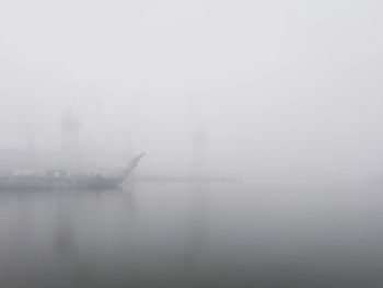 Scenic view of sea in foggy weather